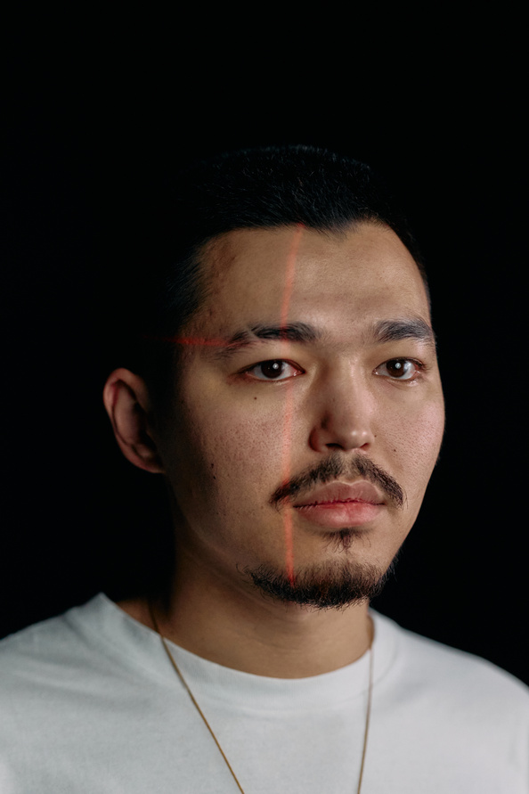 Portrait Photo of Man in White Crew Neck Shirt